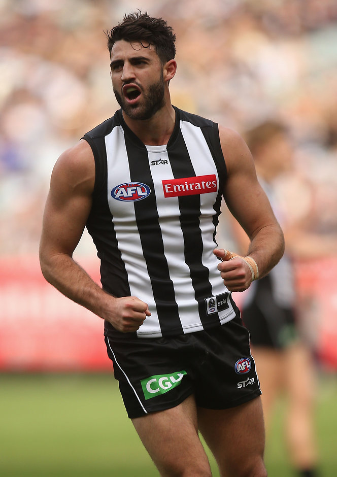 AFL 2016 Rd 09 - Collingwood v Geelong MELBOURNE, AUSTRALIA - MAY 21: Alex Fasolo of the Magpies celebrates a goal during the 2016 AFL Round 09 match between the Collingwood Magpies and the Geelong Cats at the Melbourne Cricket Ground on May 21, 2016 in Melbourne, Australia. (Photo by Sean Garnsworthy/AFL Media)